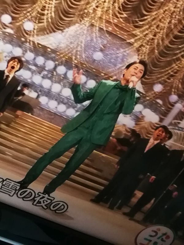 緑色のスーツ