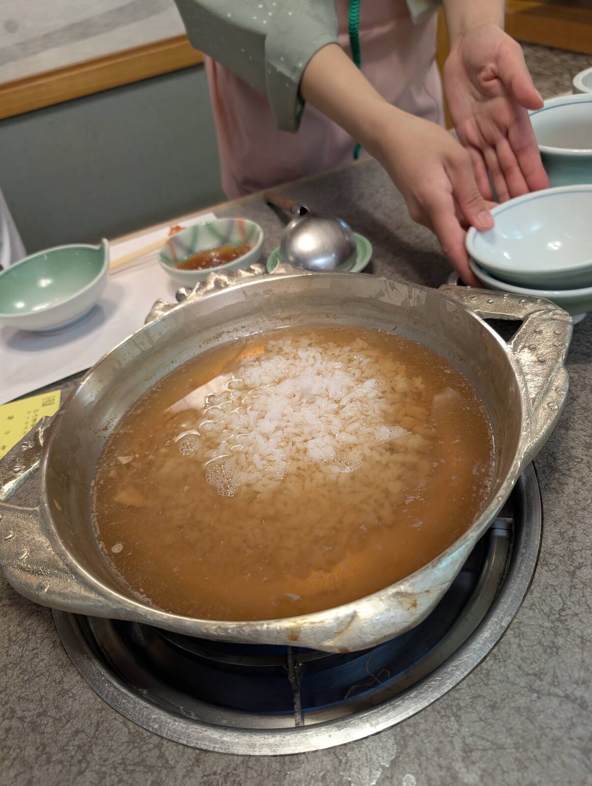 雑炊の準備